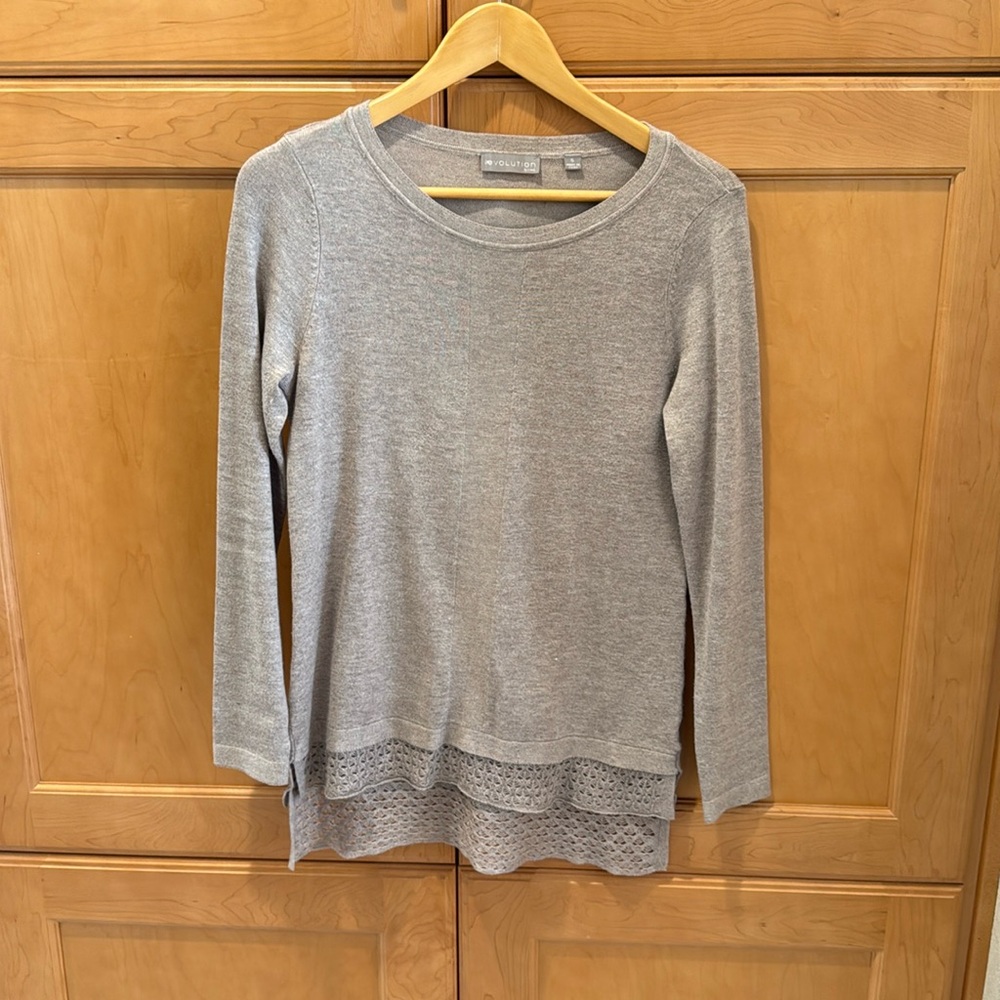Taupe sweater with lovely crochet detail.